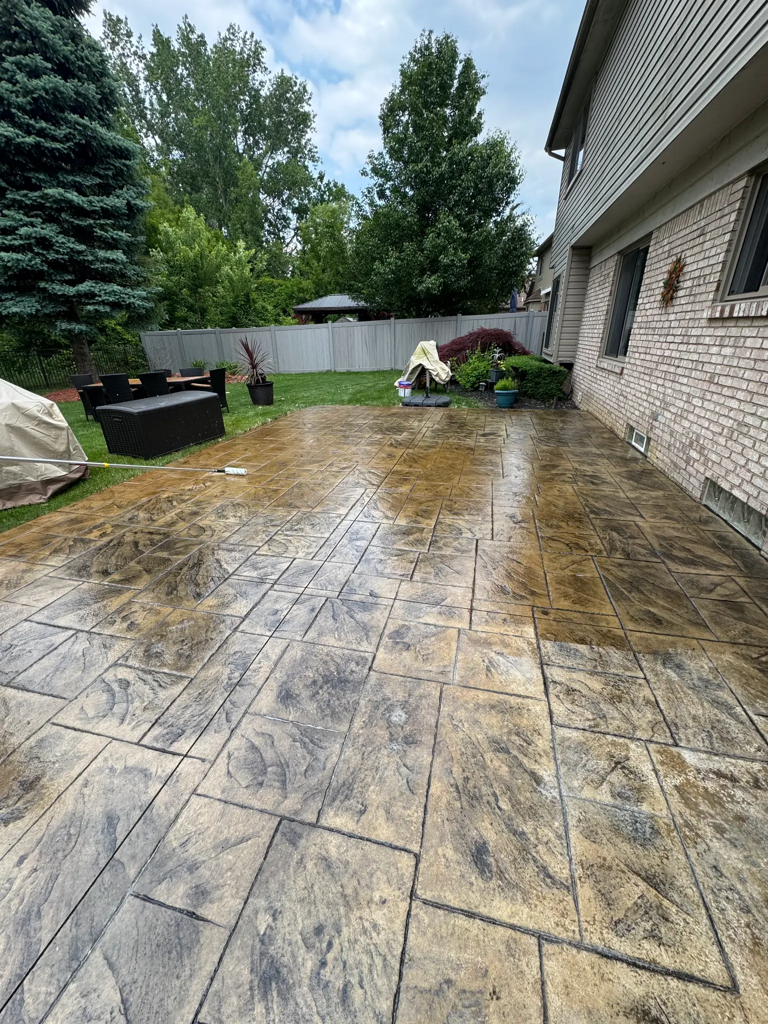 A real Austin stamped patio with the color sealed back in.