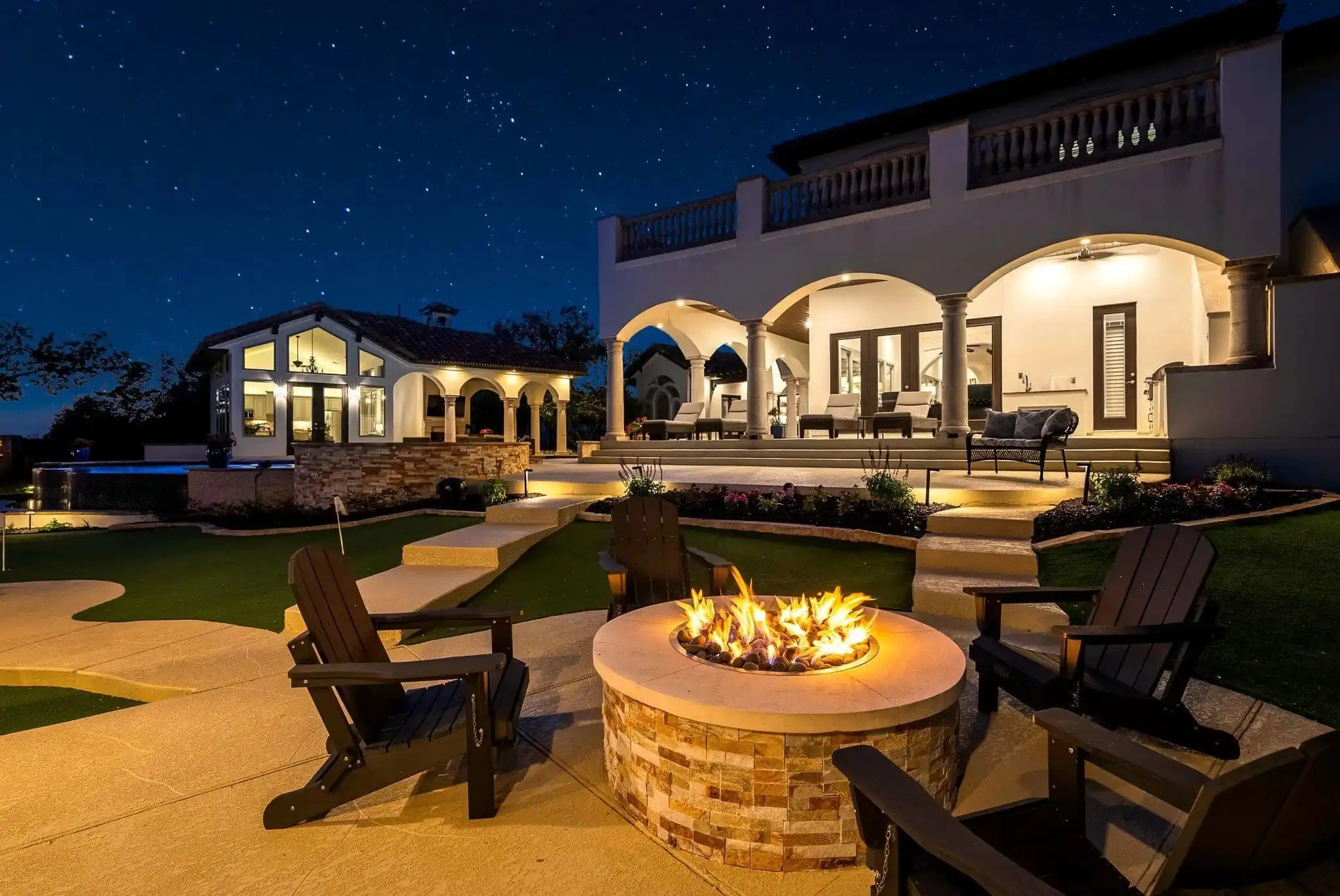 An outdoor stone living area sealed and ready for entertaining.